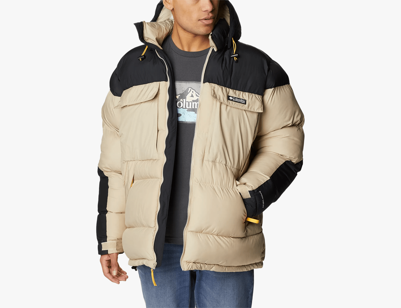 columbia ballistic ridge puffer in tan with black shoulders collar and hood