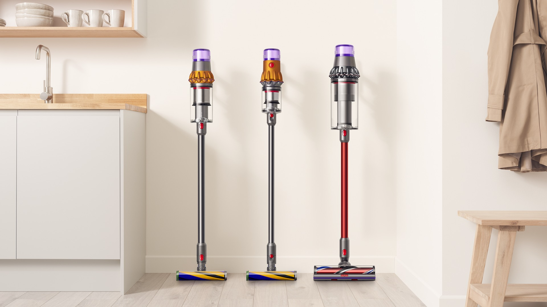 dyson stick vacuums in a clean kitchen nook