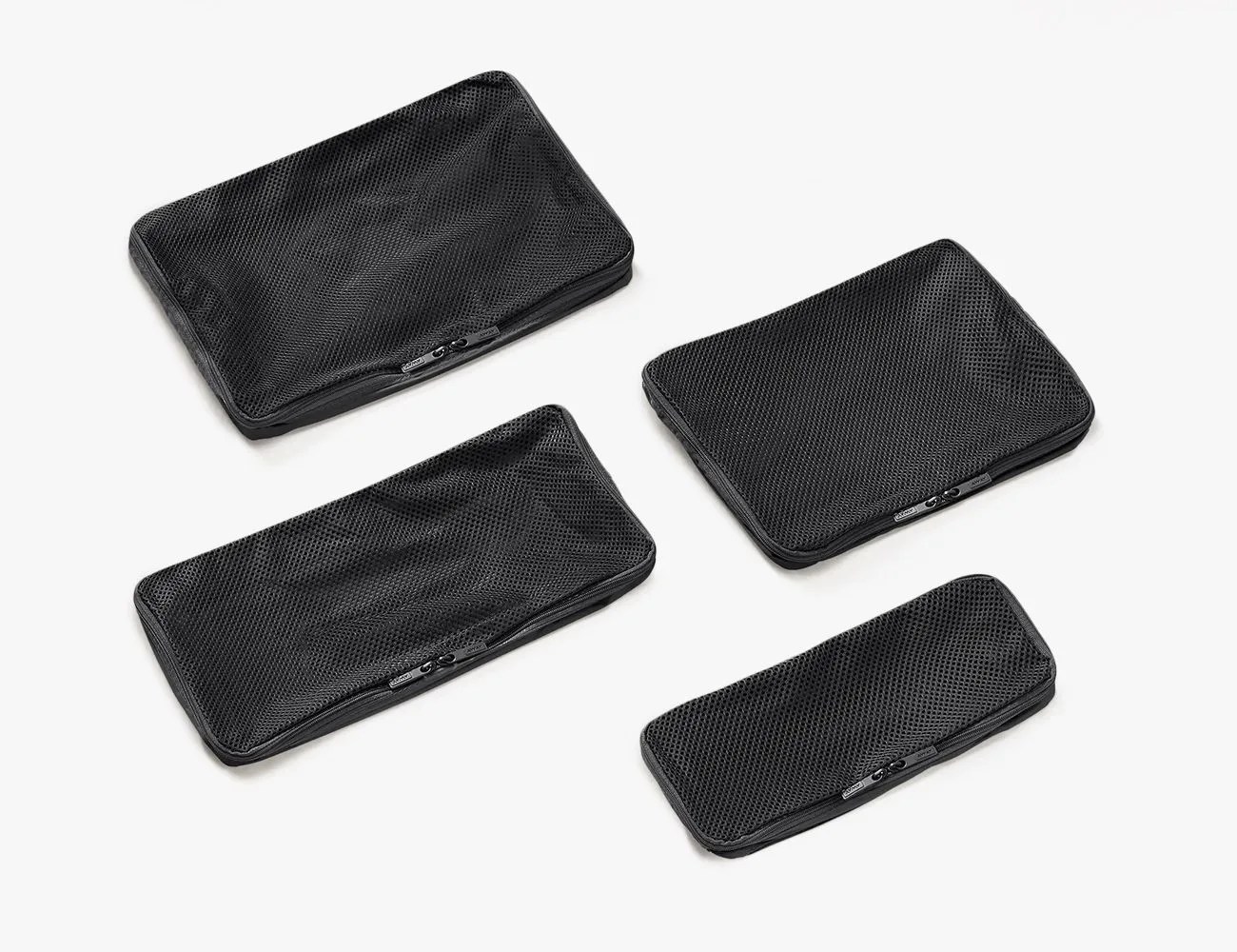 set of four packing cubes