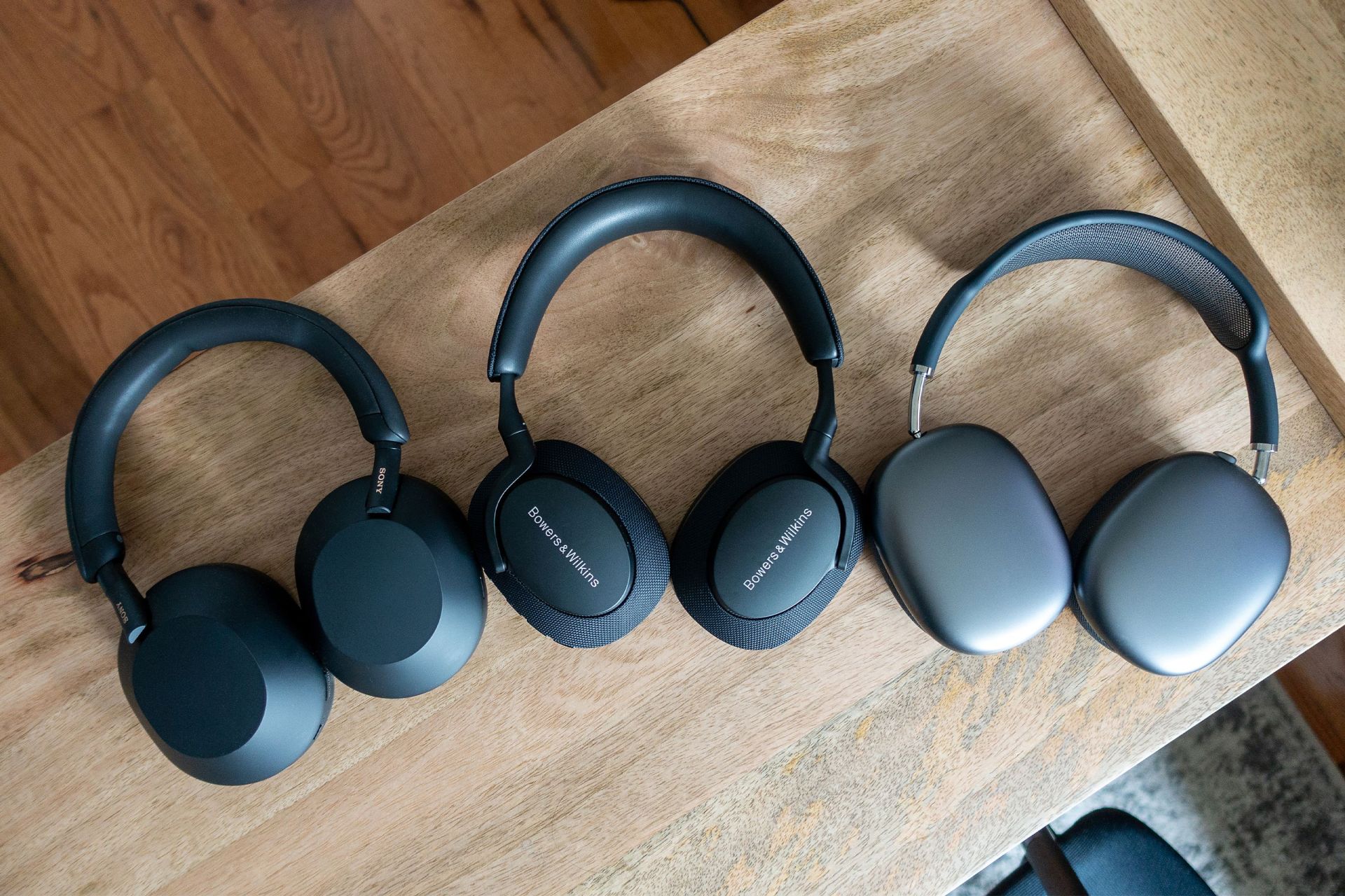 three headphones laying next to each other