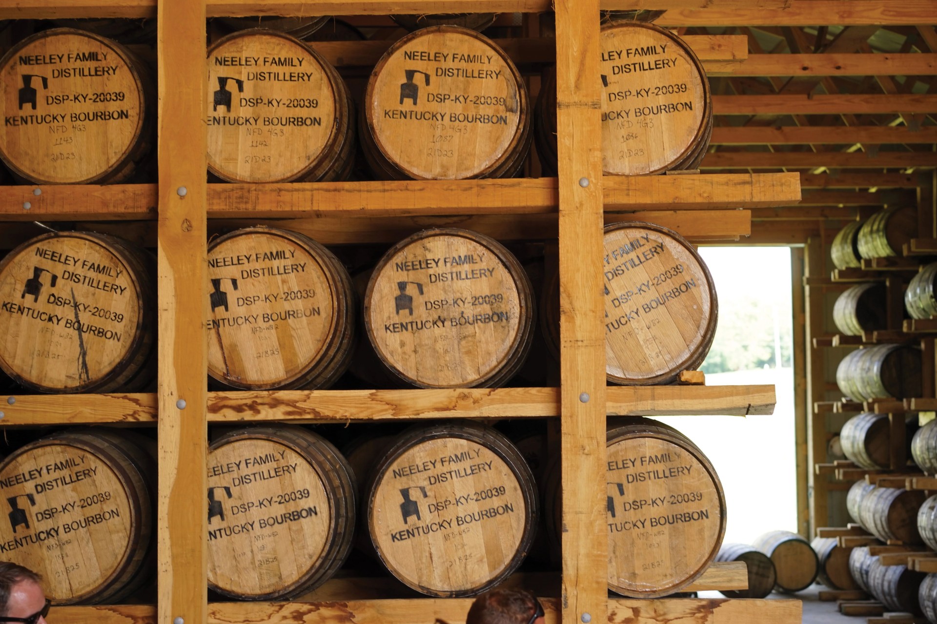 barrels of whiskey in a cellar