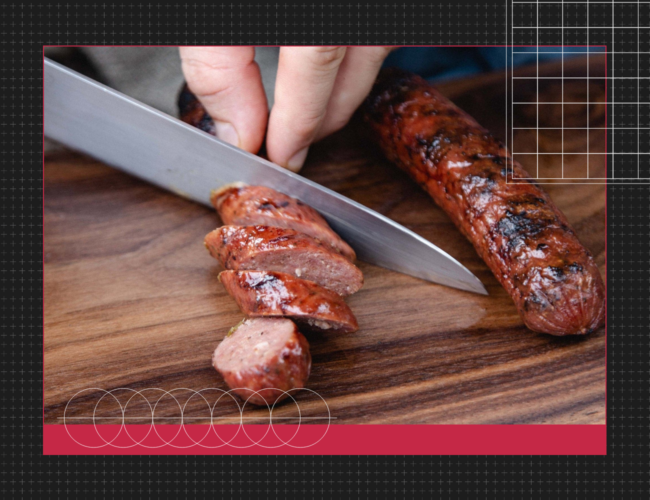 a person cutting sausage links