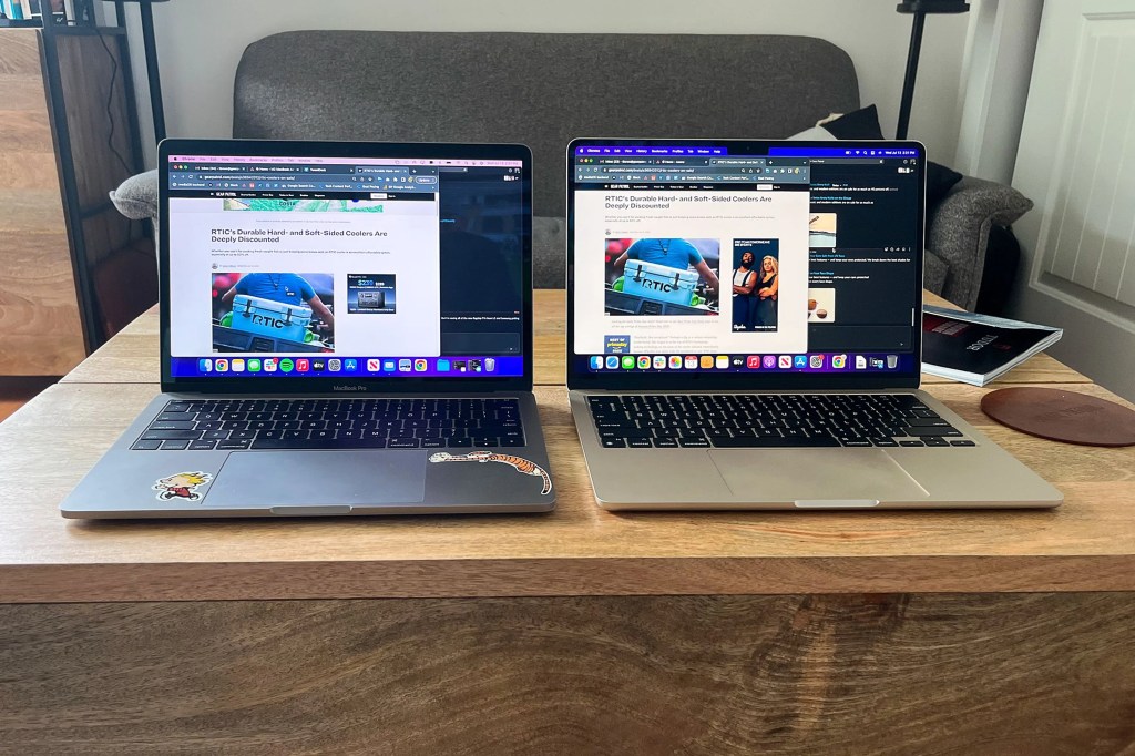 two macbooks on a table