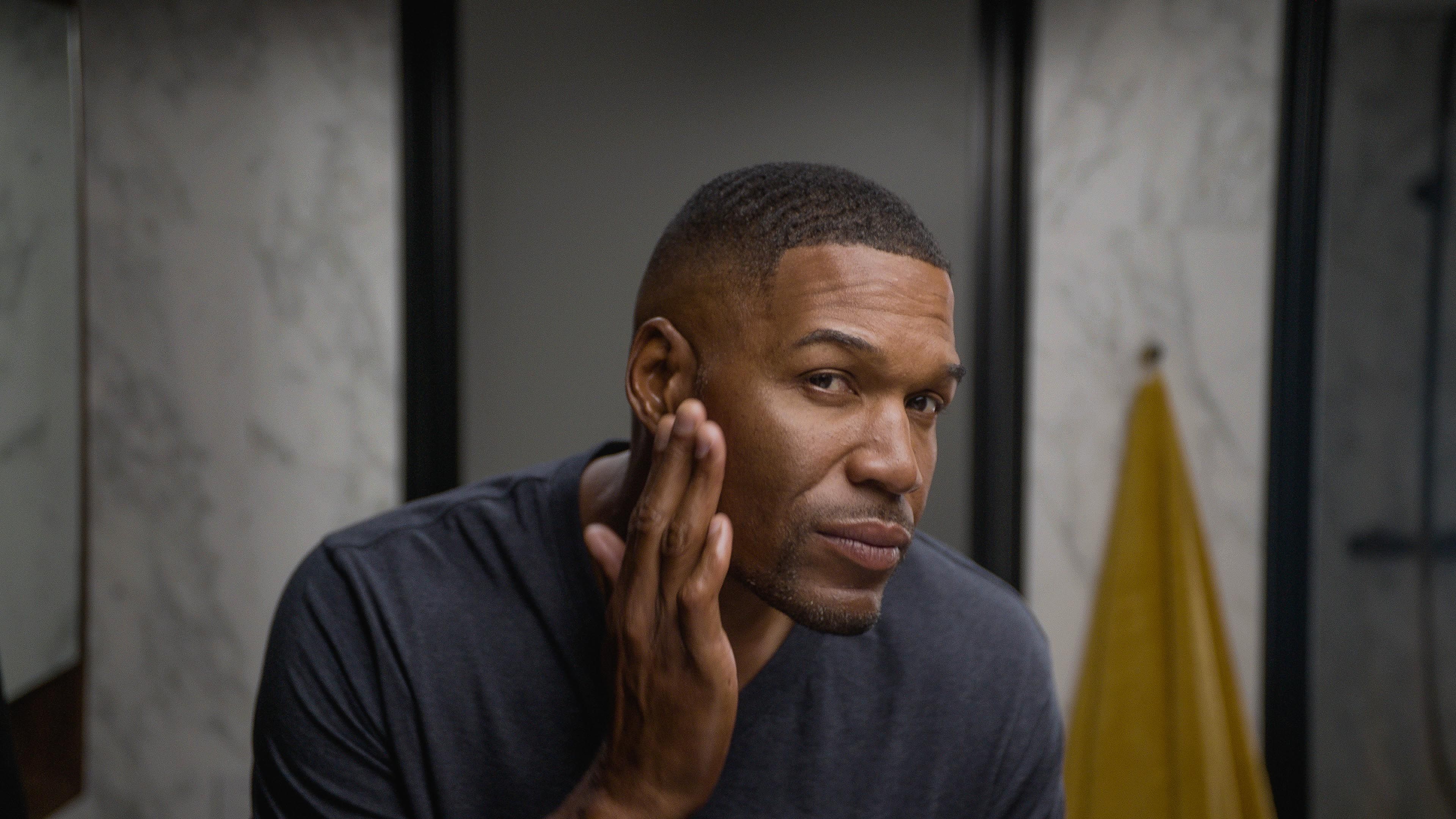 ms applying beard oil