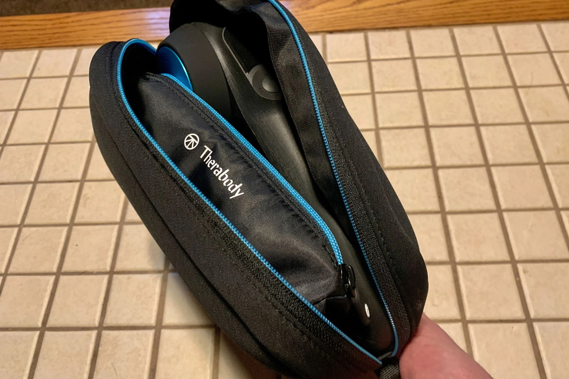 a therabody massage gun in a case