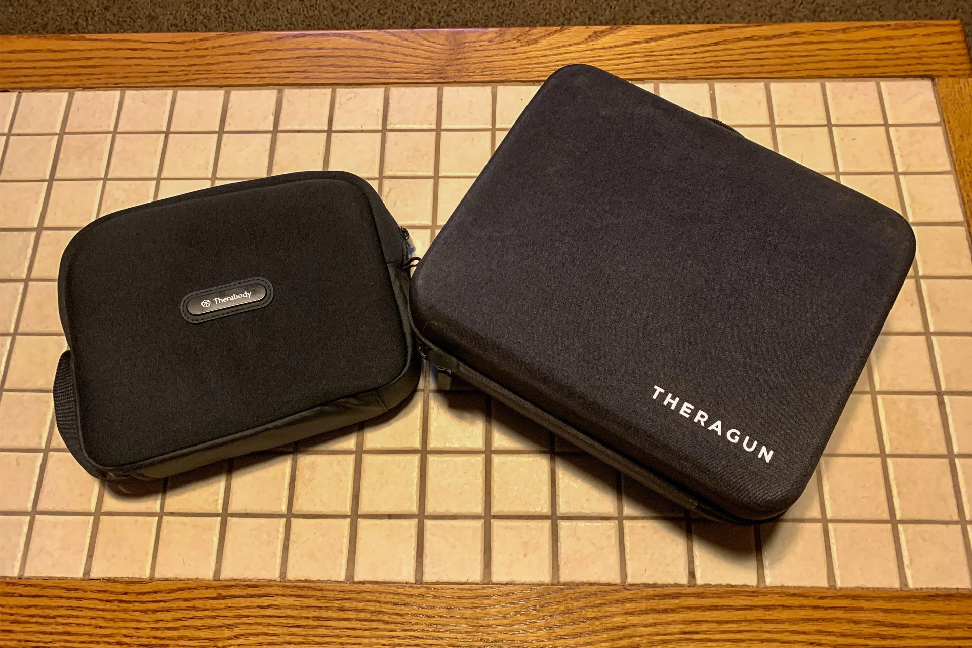 two therabody massage gun cases on a counter