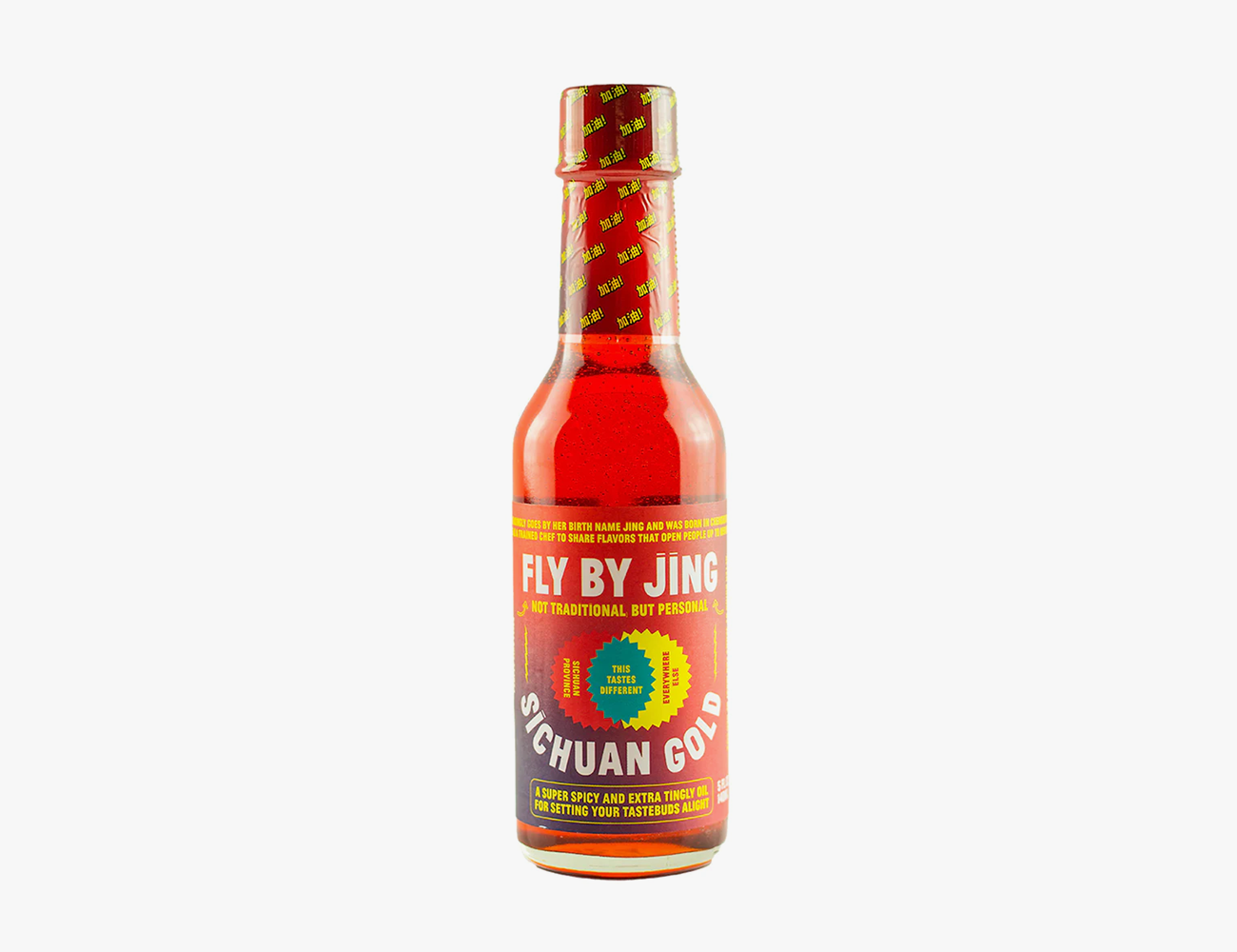 a red bottle of fly by jing sichuan gold with yellow accents