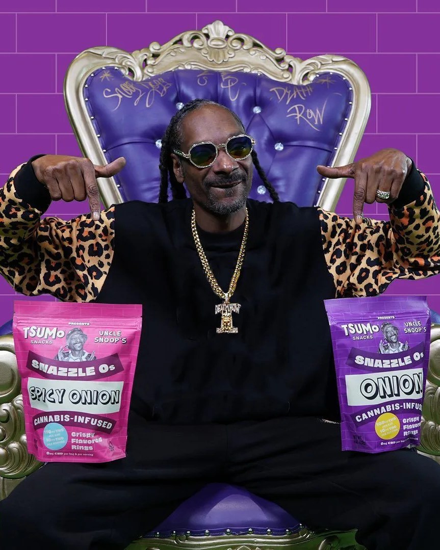 snoop dog posing with cannabis infused tsumo snacks