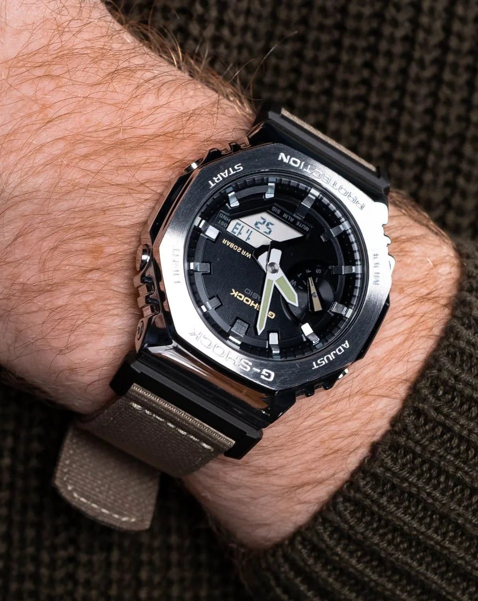 person wearing g shock casioak watch