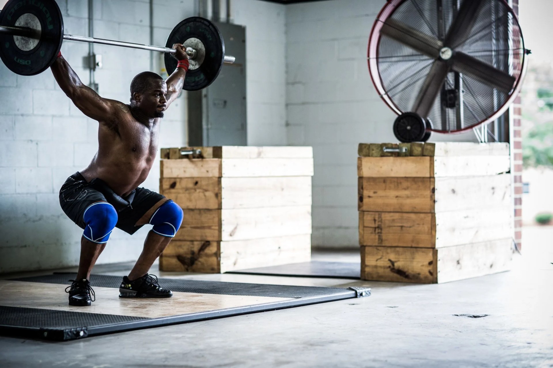 gym man lifting weights