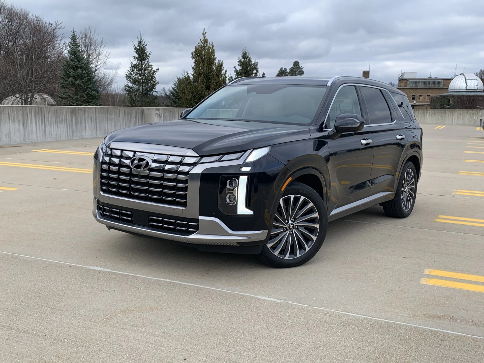 hyundai palisade from front quarter angle in a parking lot
