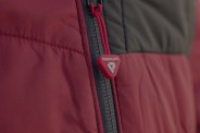 a red jacket with a primaloft zipper