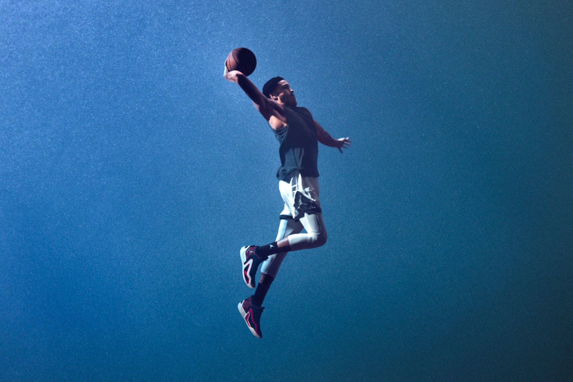 jordan brand dunking wearing the tatum 1 sneakers