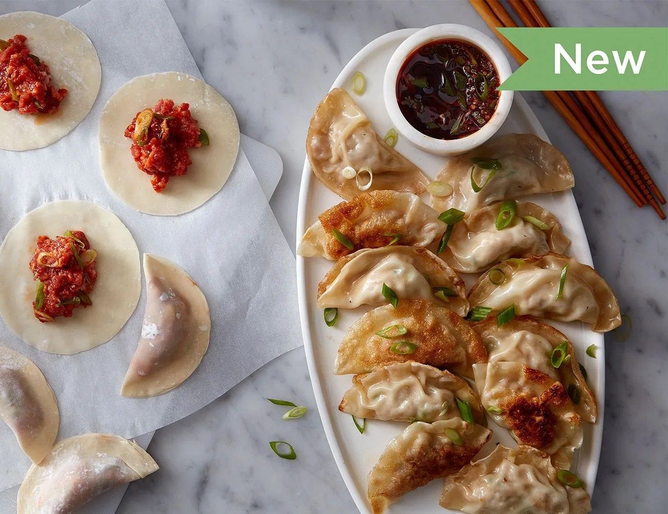 dumplings on a table and a tray