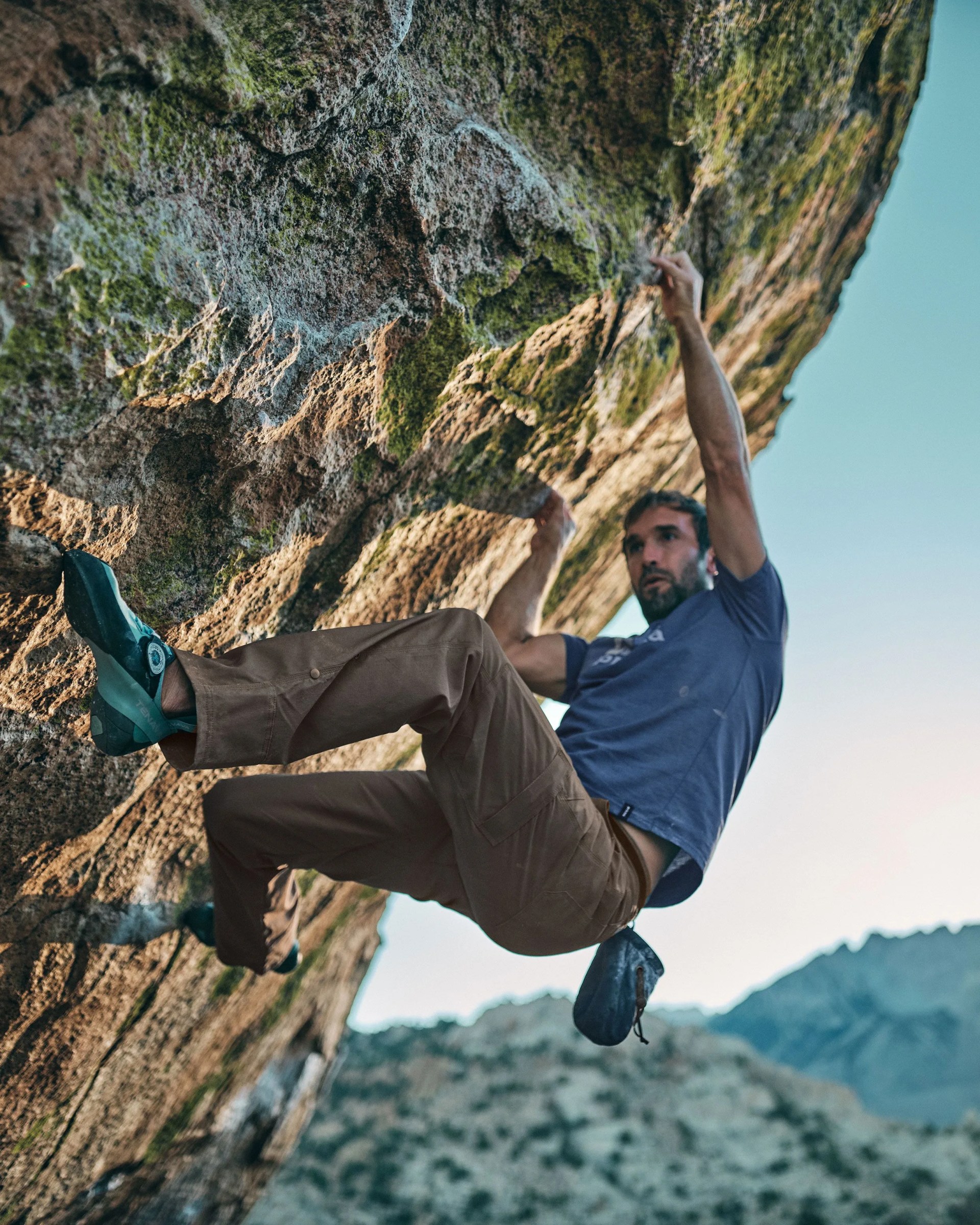 man bouldering wearing climbing gear from prana