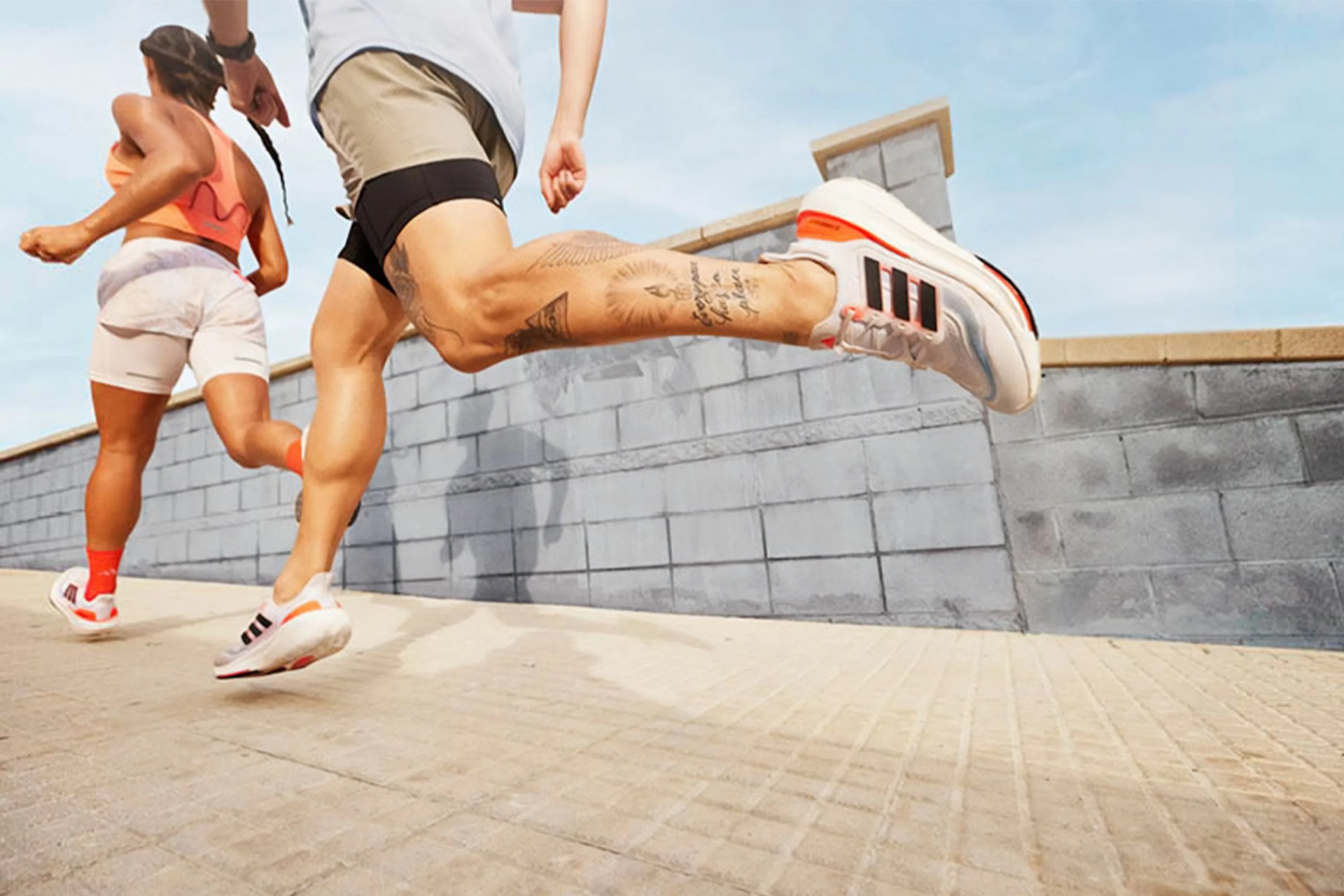 two people running