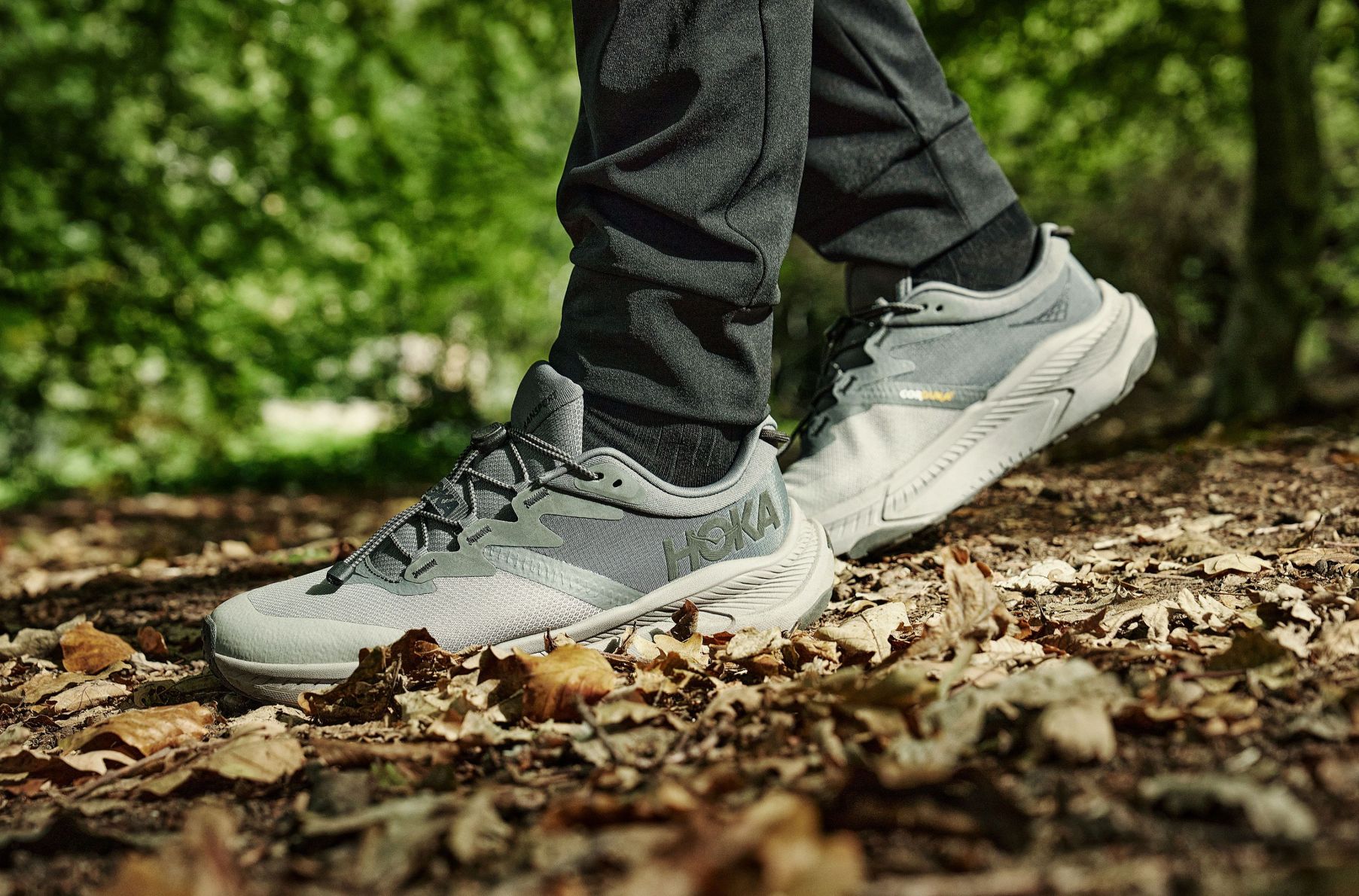 man wearing hoka transport sneaker