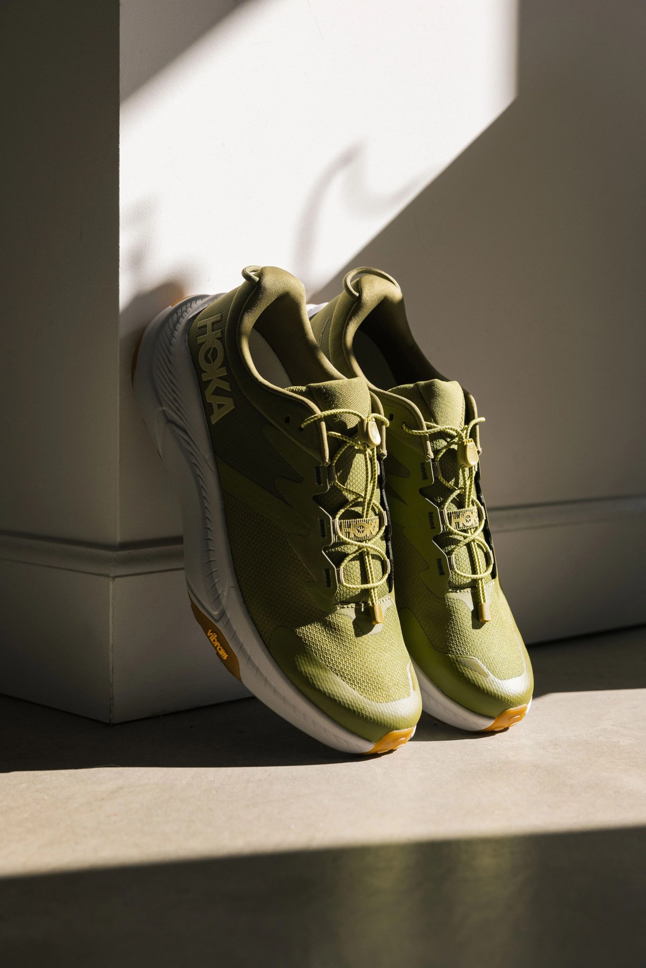 hoka transport sneakers