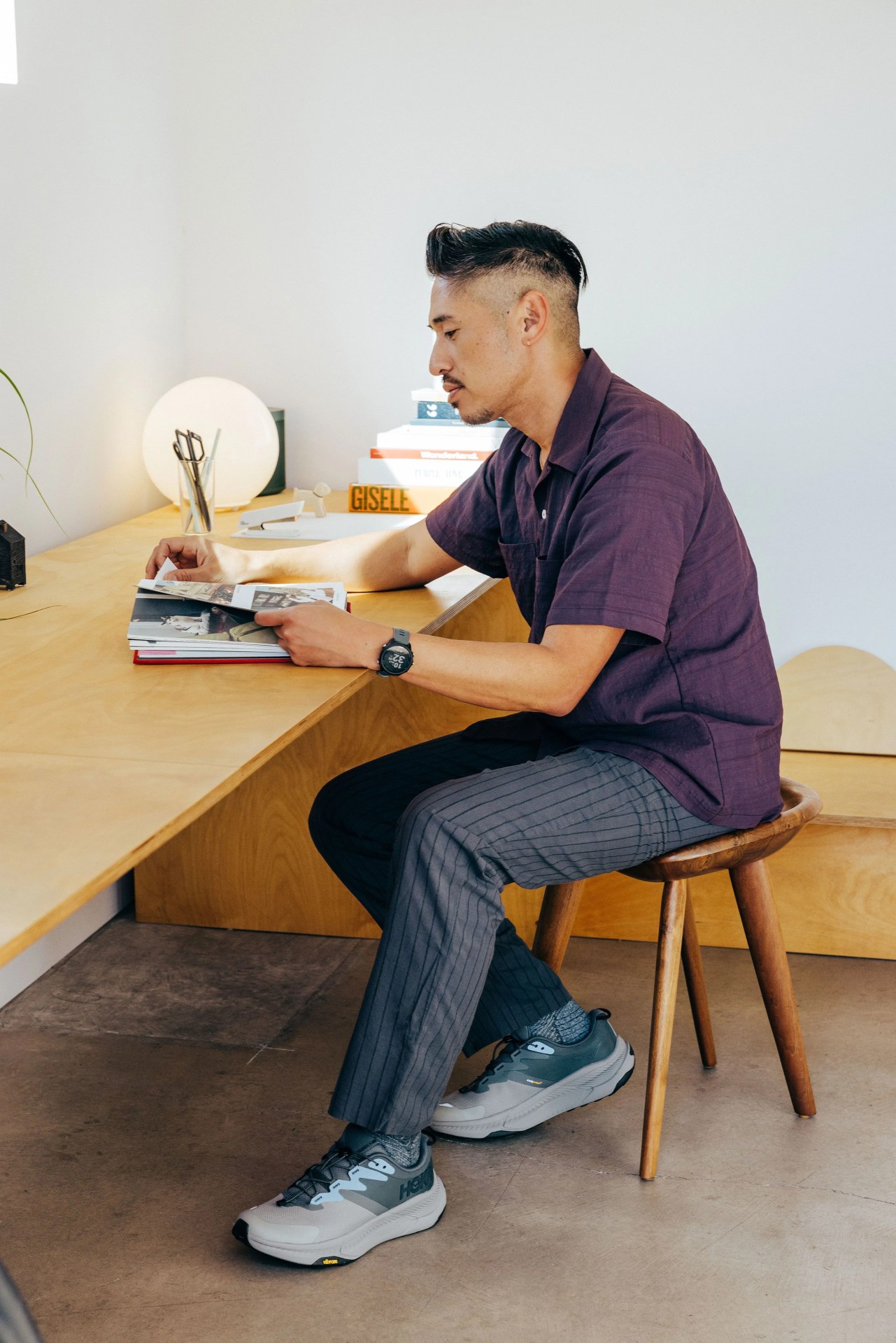 ja tecson wearing hoka transport sneakers