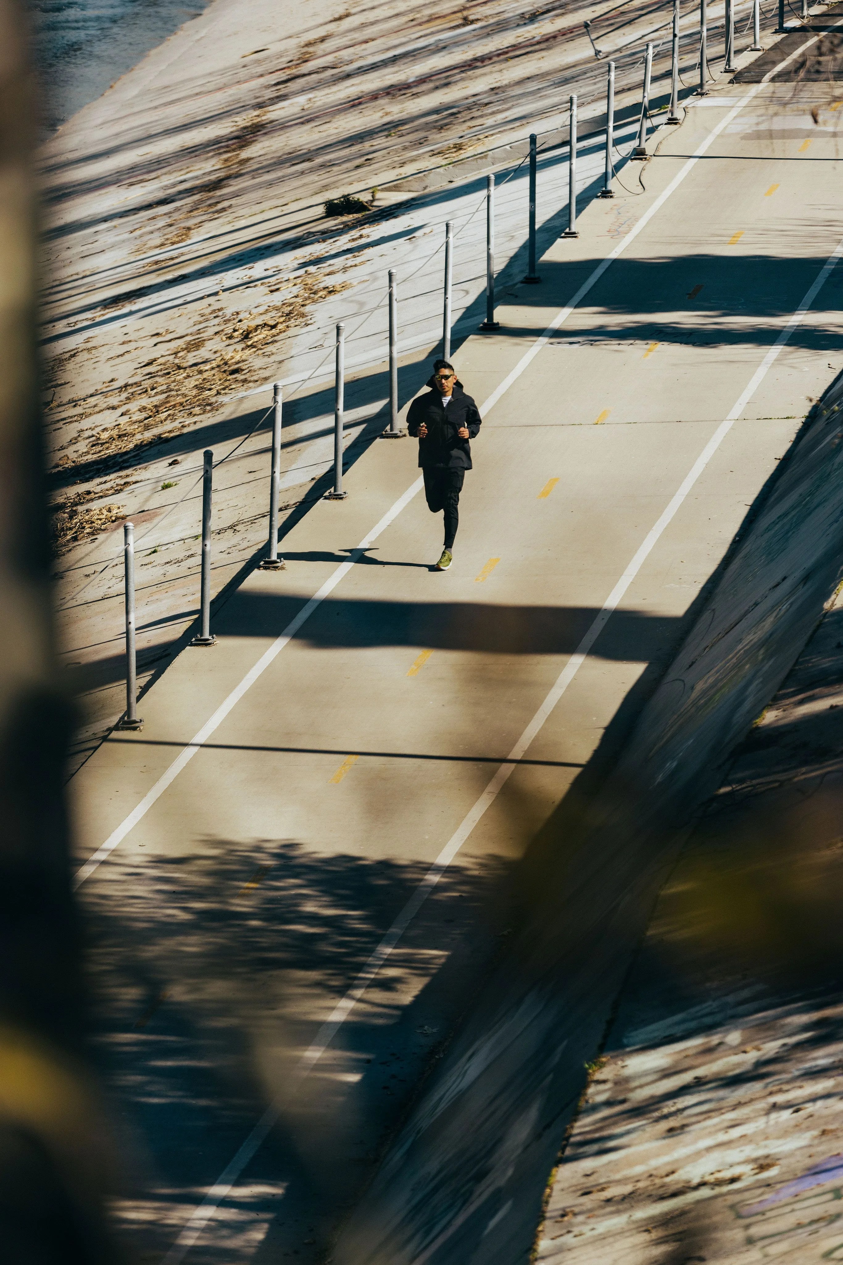 ja tecson jogging wearing hoka transport sneakers