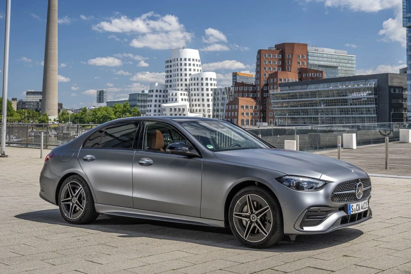 mercedes benz c class parked on a roof deck
