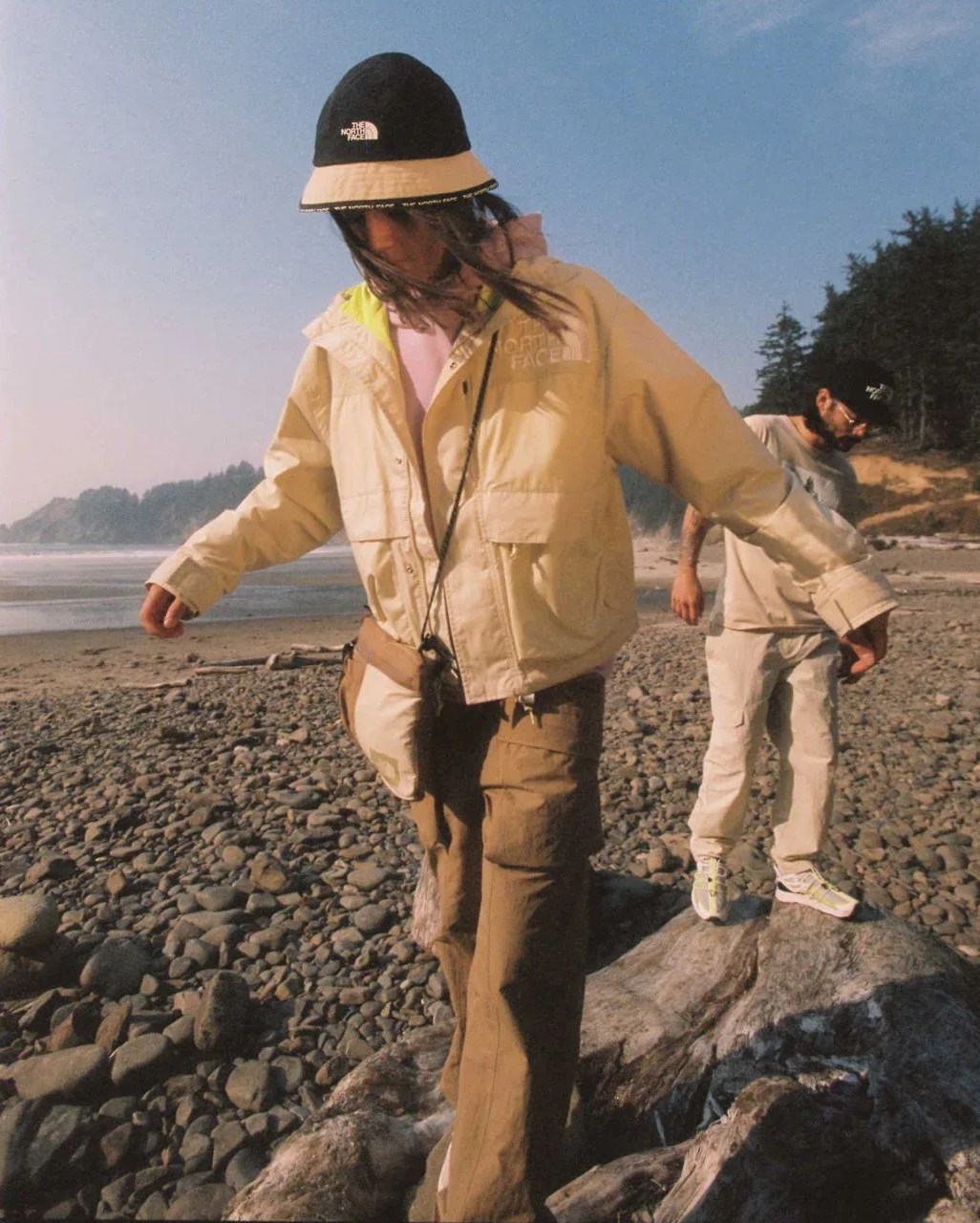 two people wearing the north face low fi hi tek collection