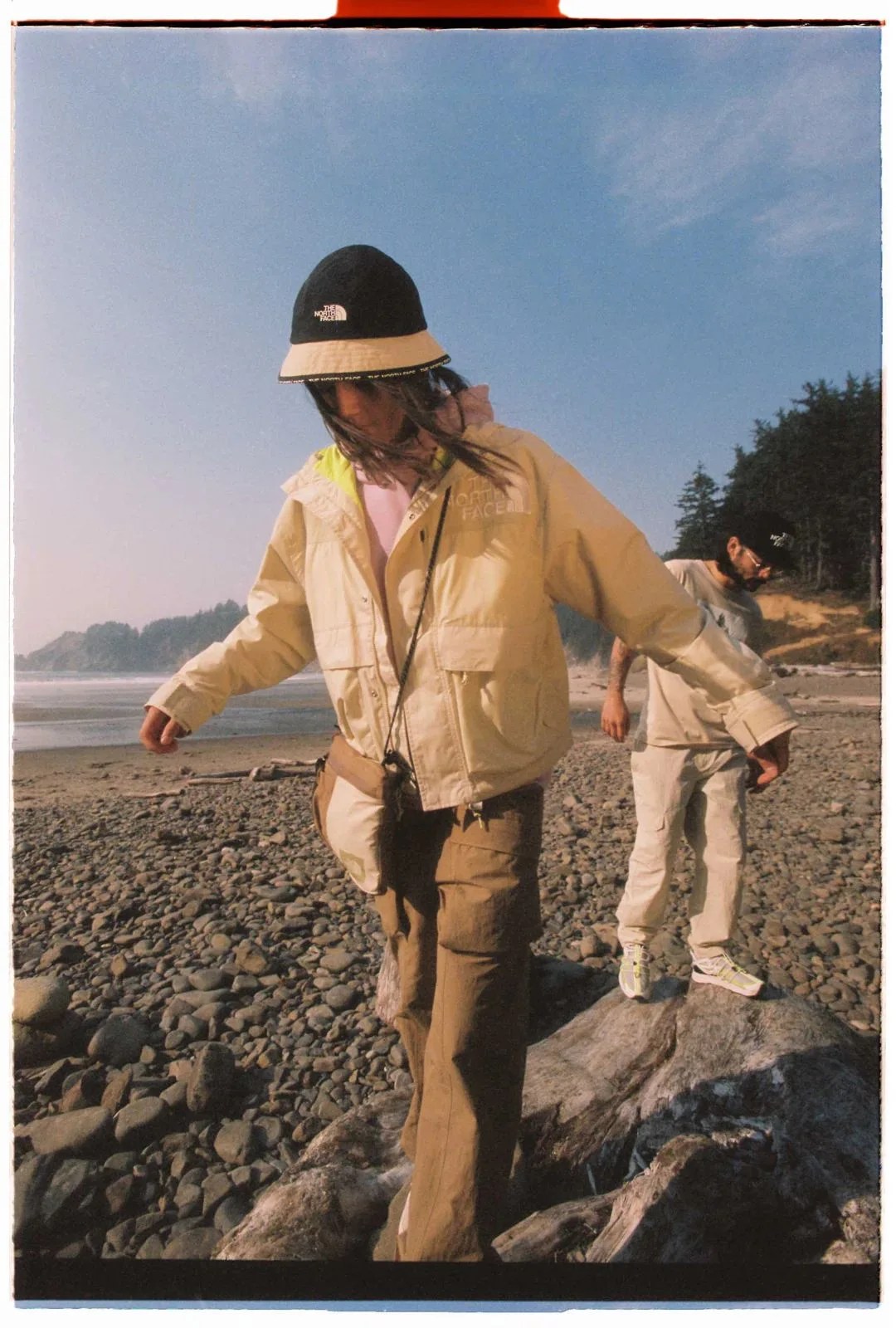 two people wearing the north face low fi hi tek collection