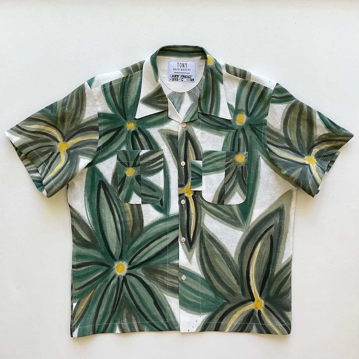 flowers painted on a button down shirt