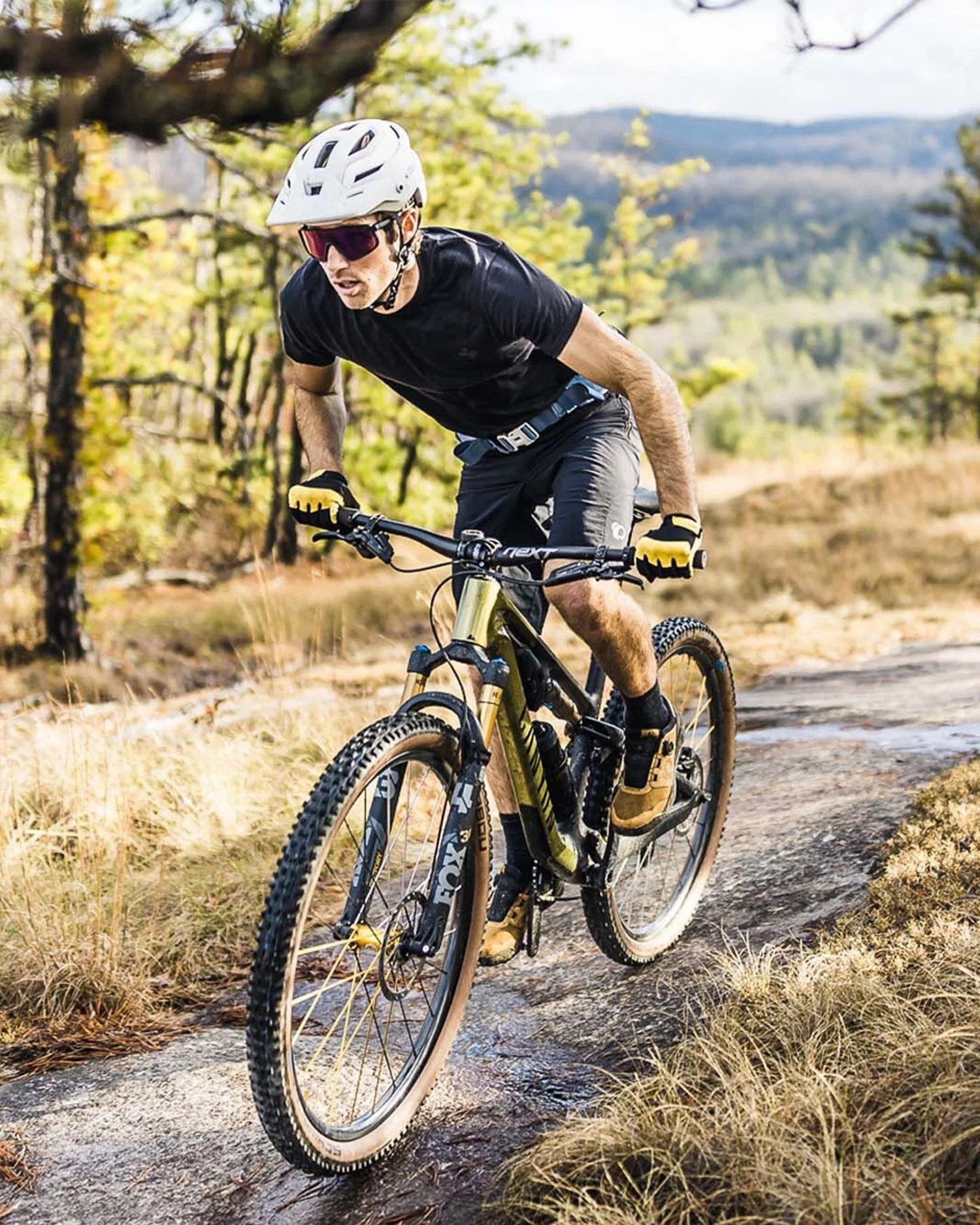 a man riding a bike on a trail