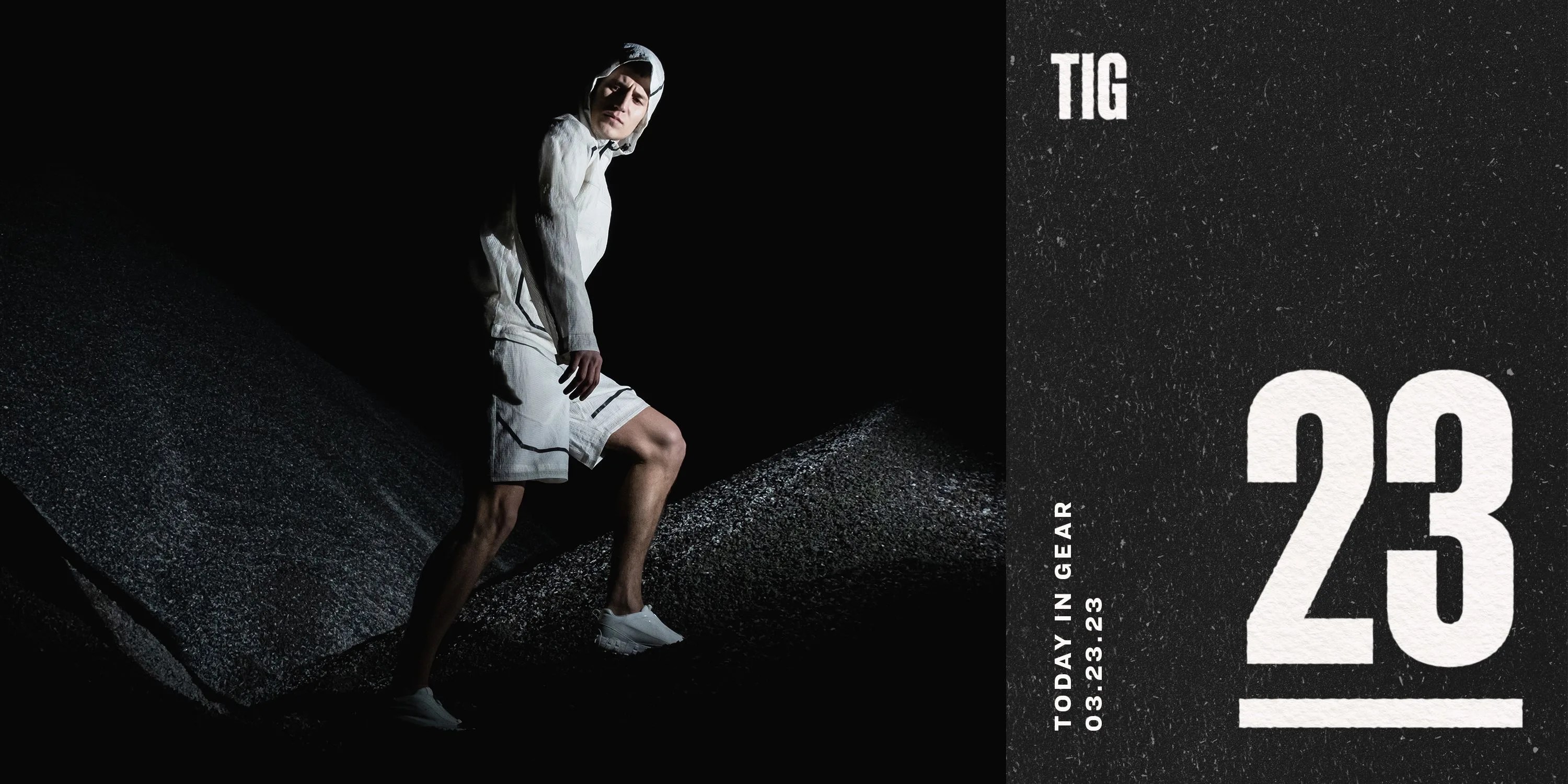 a man in white walking up a mounting in the dark next to a march 23 graphic