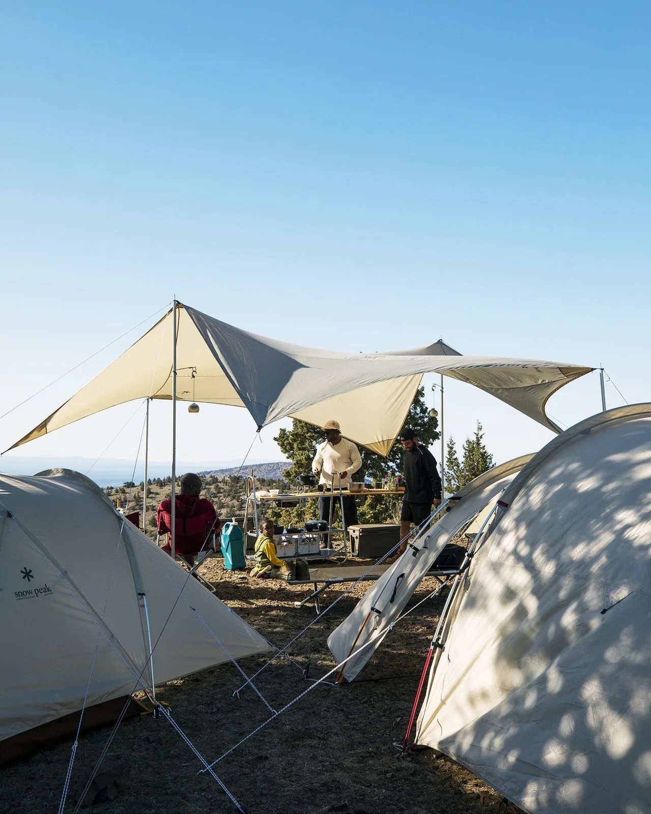 man using snow peak tents