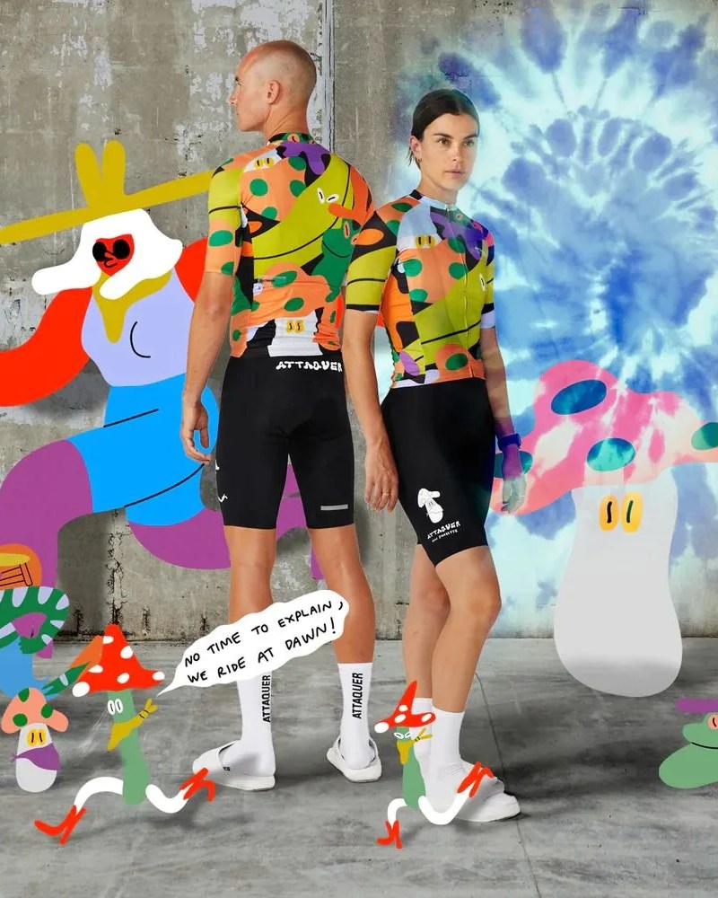 man and woman facing back to back wearing attaquer cycling clothing