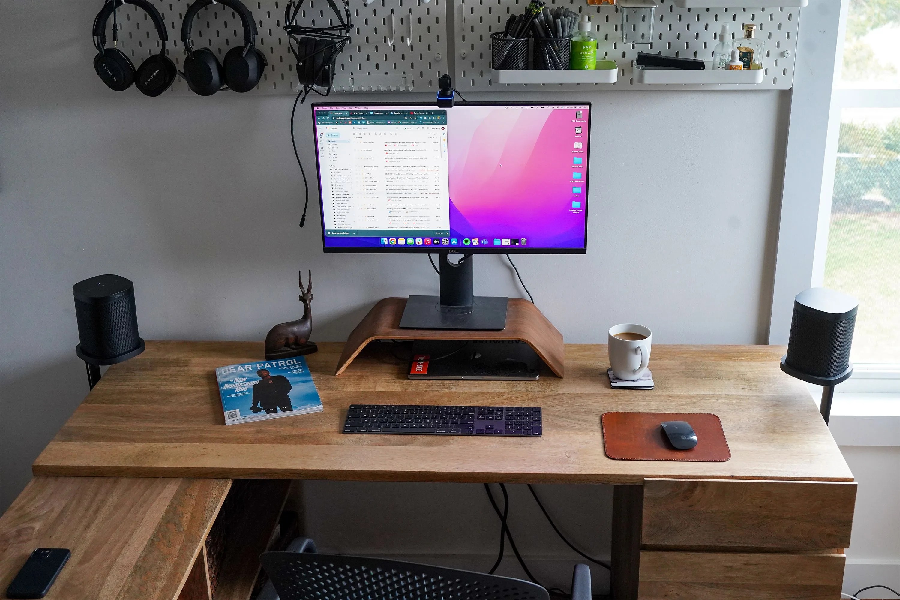 sonos speakers on a desk next to a computer