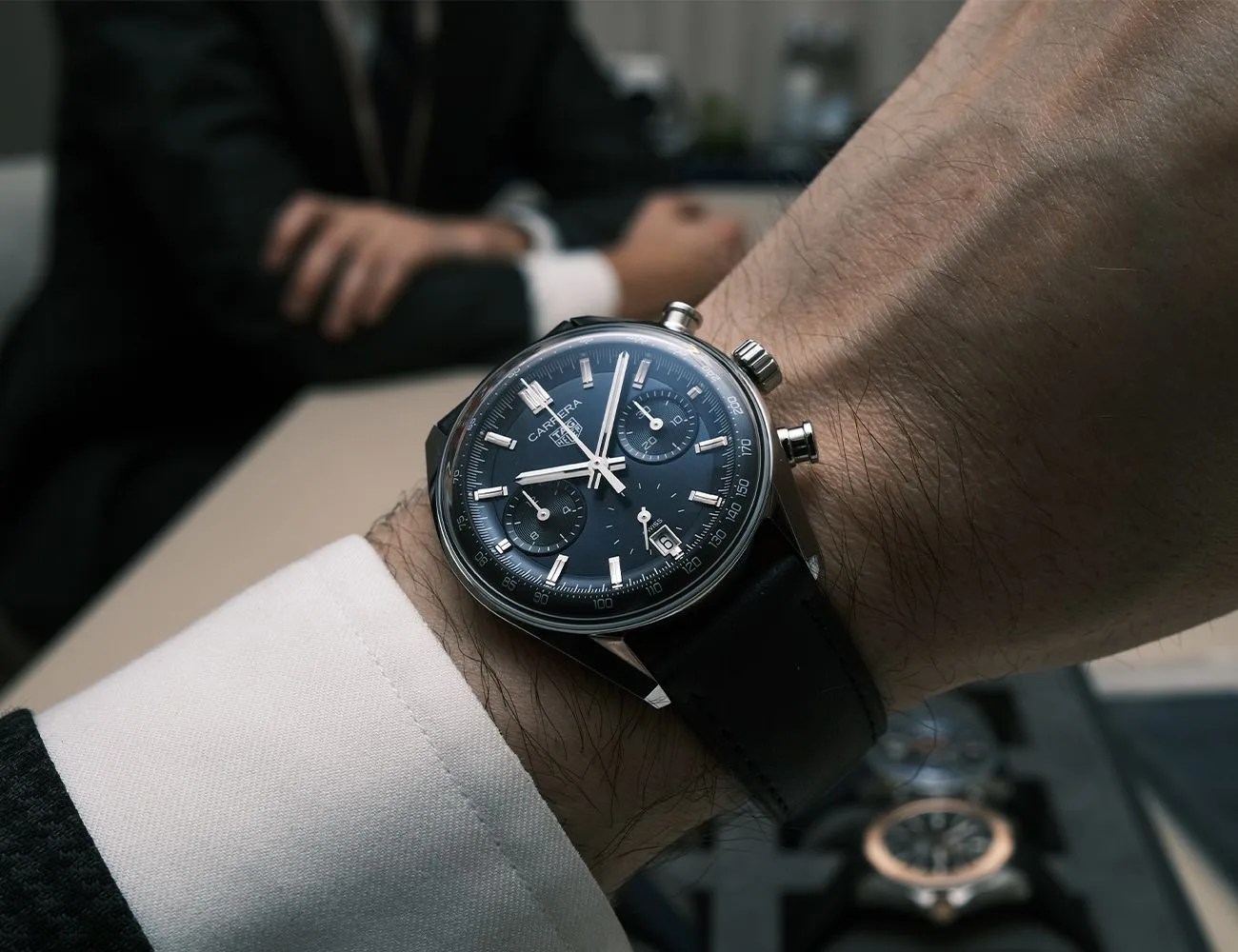 a tag heuer watch on a wrist
