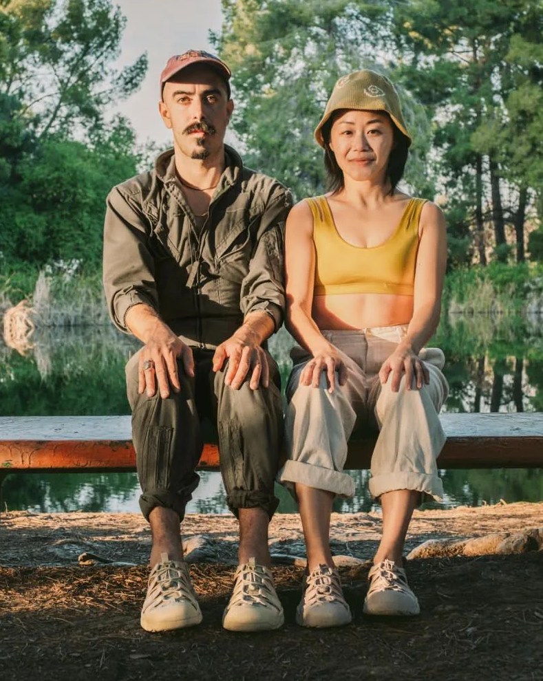 man and woman wearing keen newport h2 sneakers