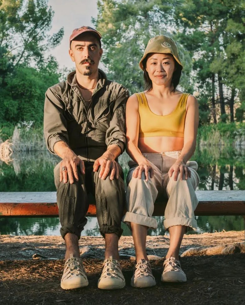 man and woman wearing keen newport h2 sneakers