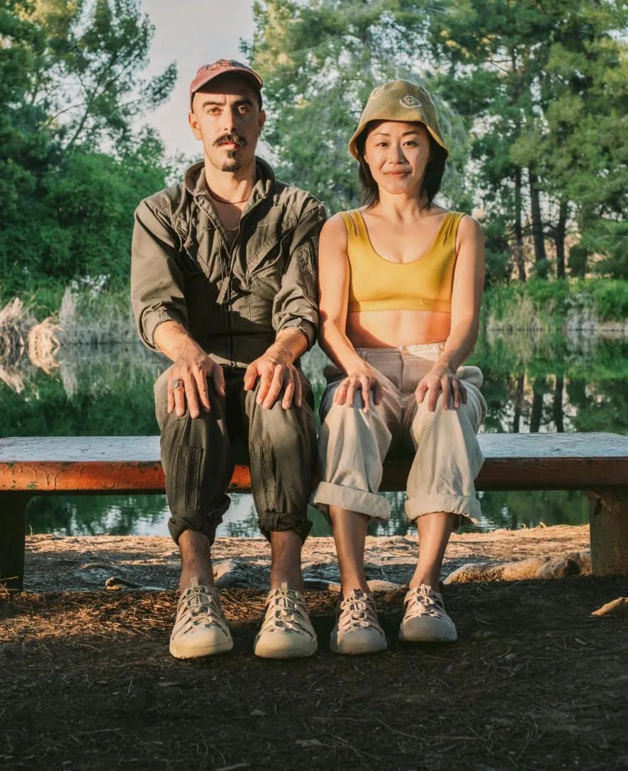 man and woman wearing keen newport h2 sneakers