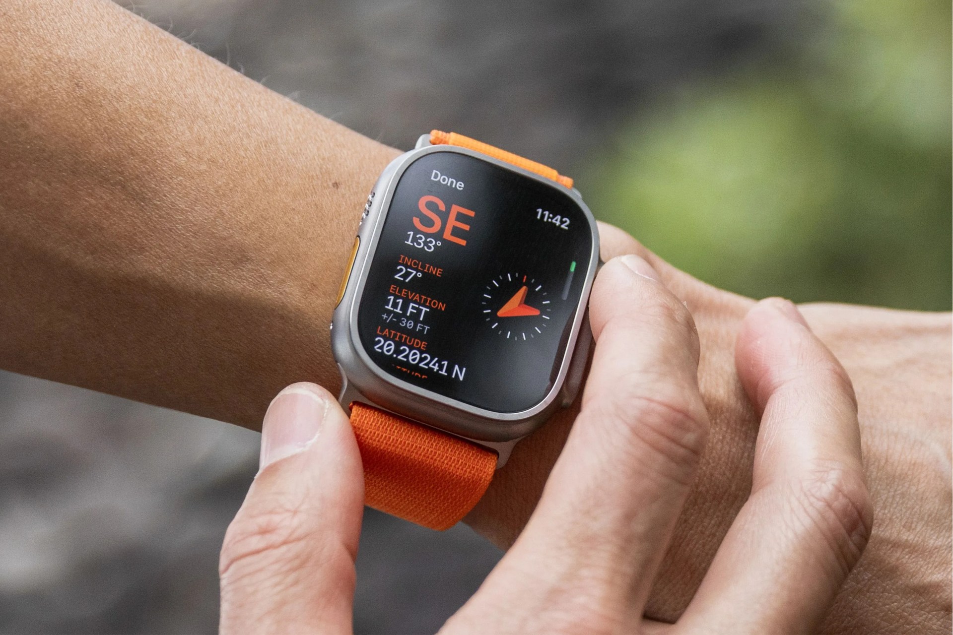 a person wearing an apple watch ultra