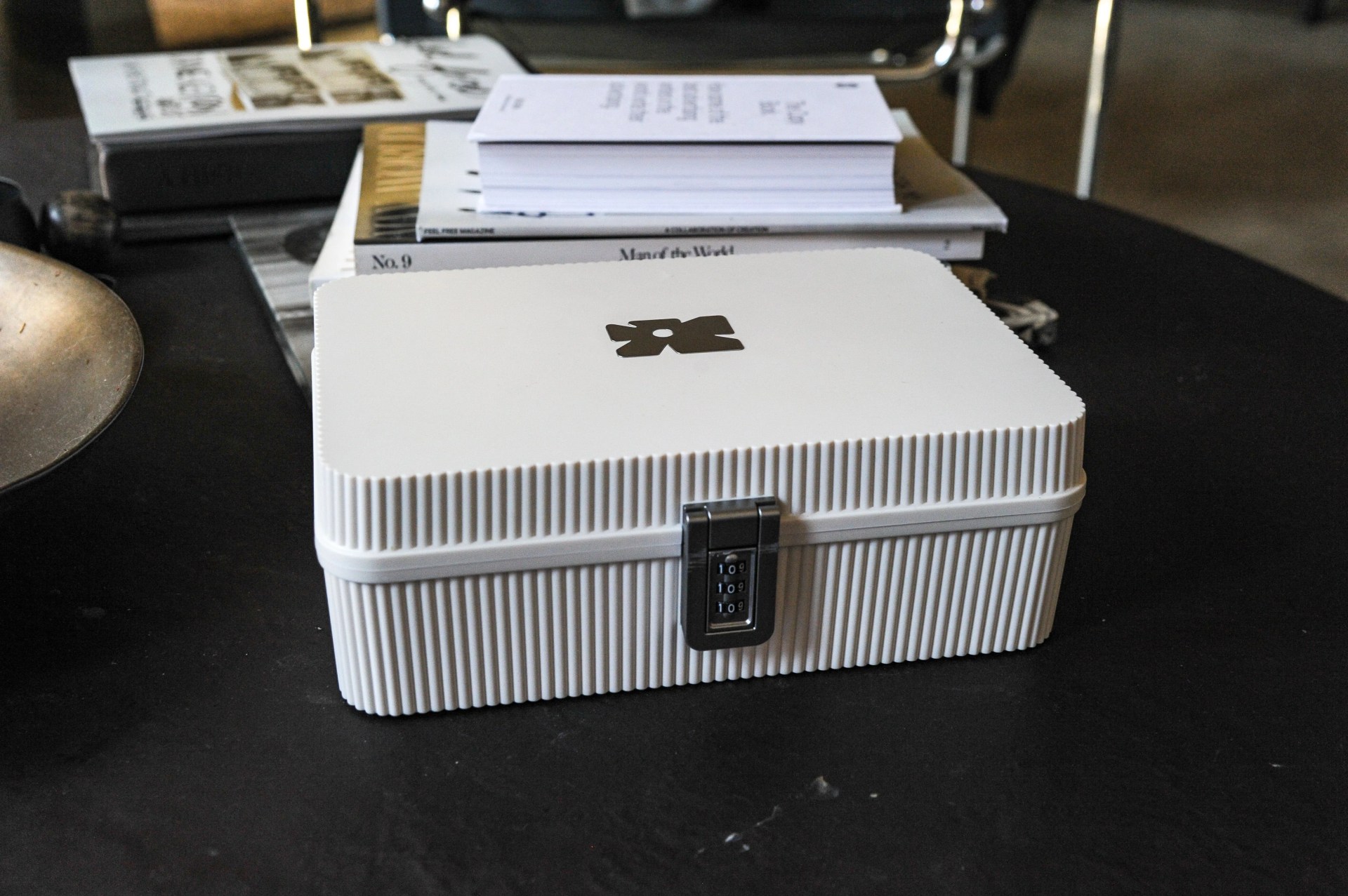 a tulip modular lockbox sitting on a coffee table
