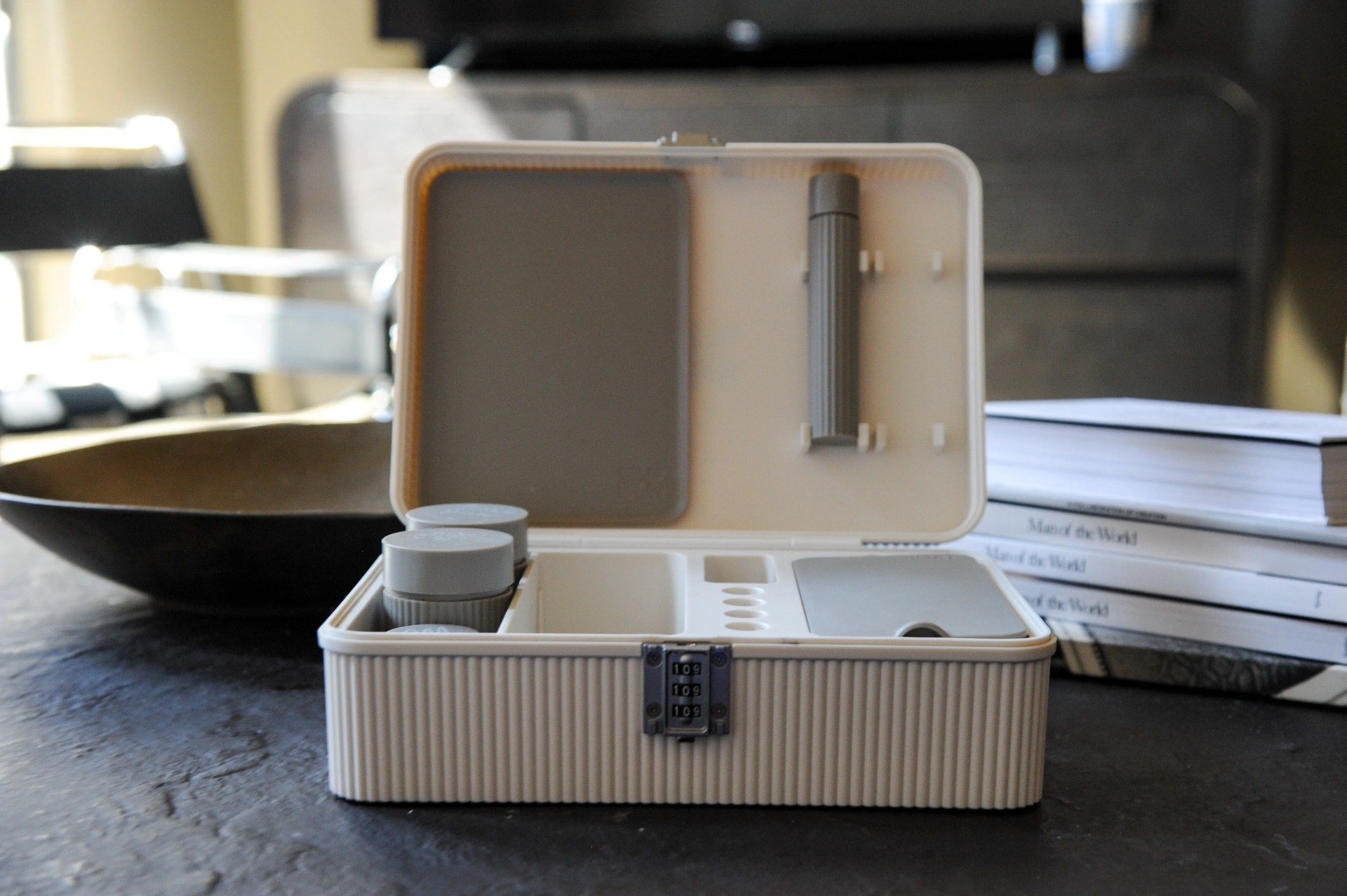 an open tulip modular lockbox sitting on a coffee table