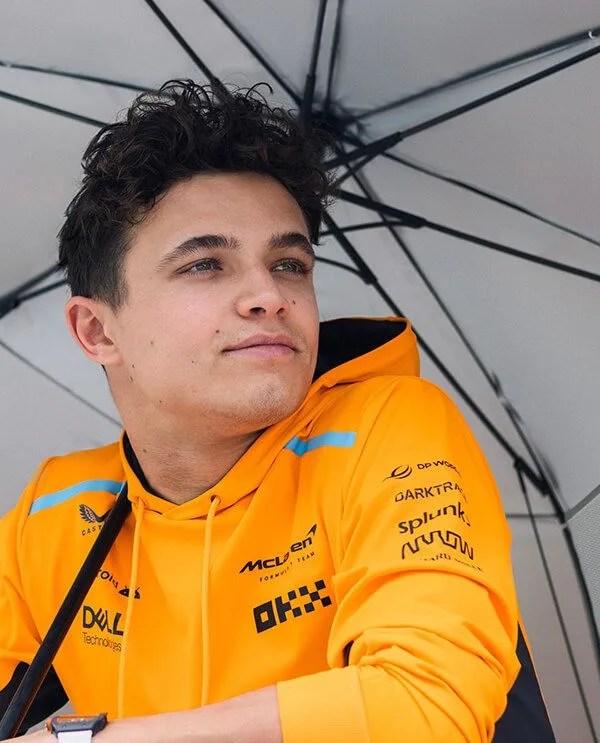 man using mclaren weatherman umbrella