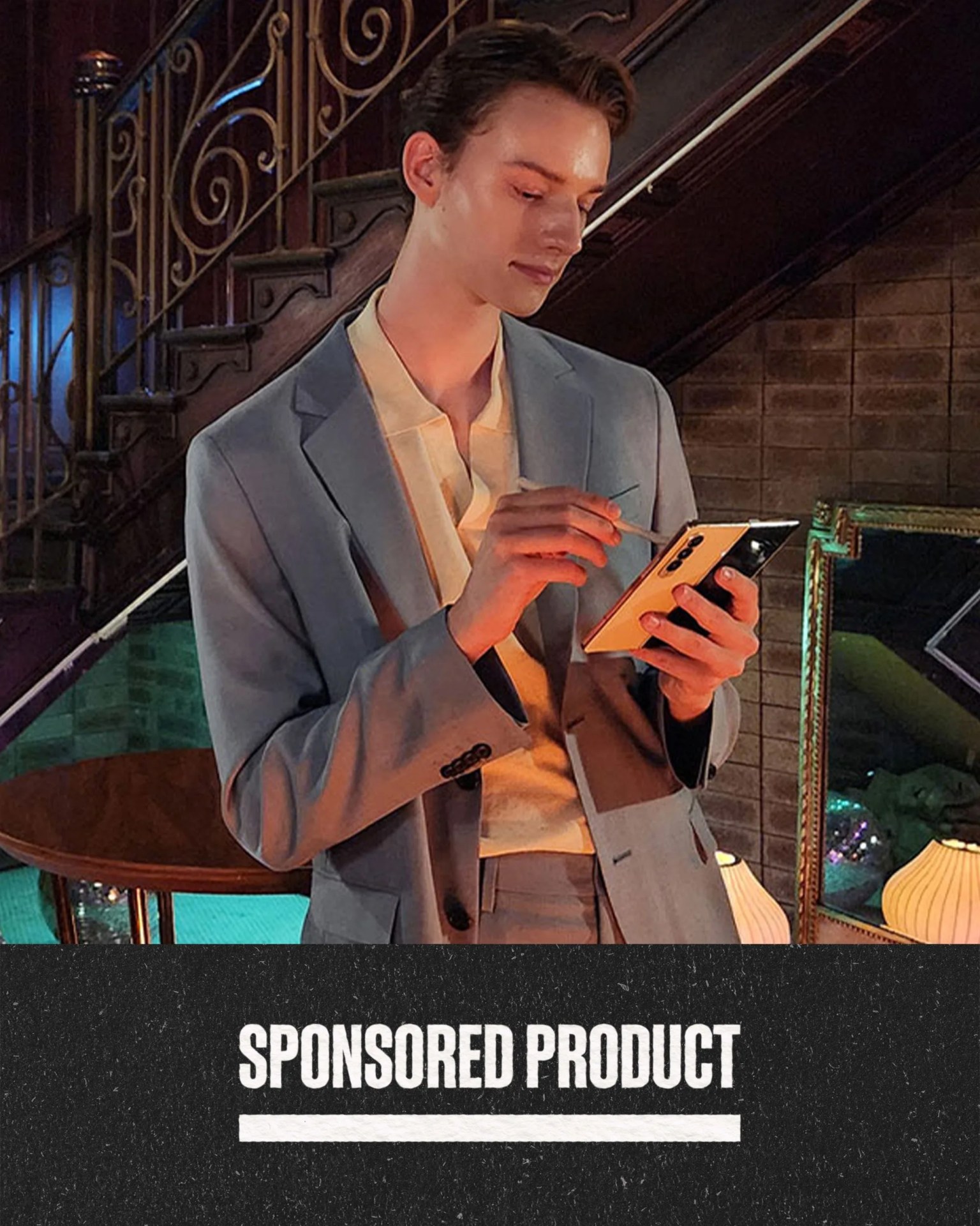 sponsored product man holding samsung galaxy s21