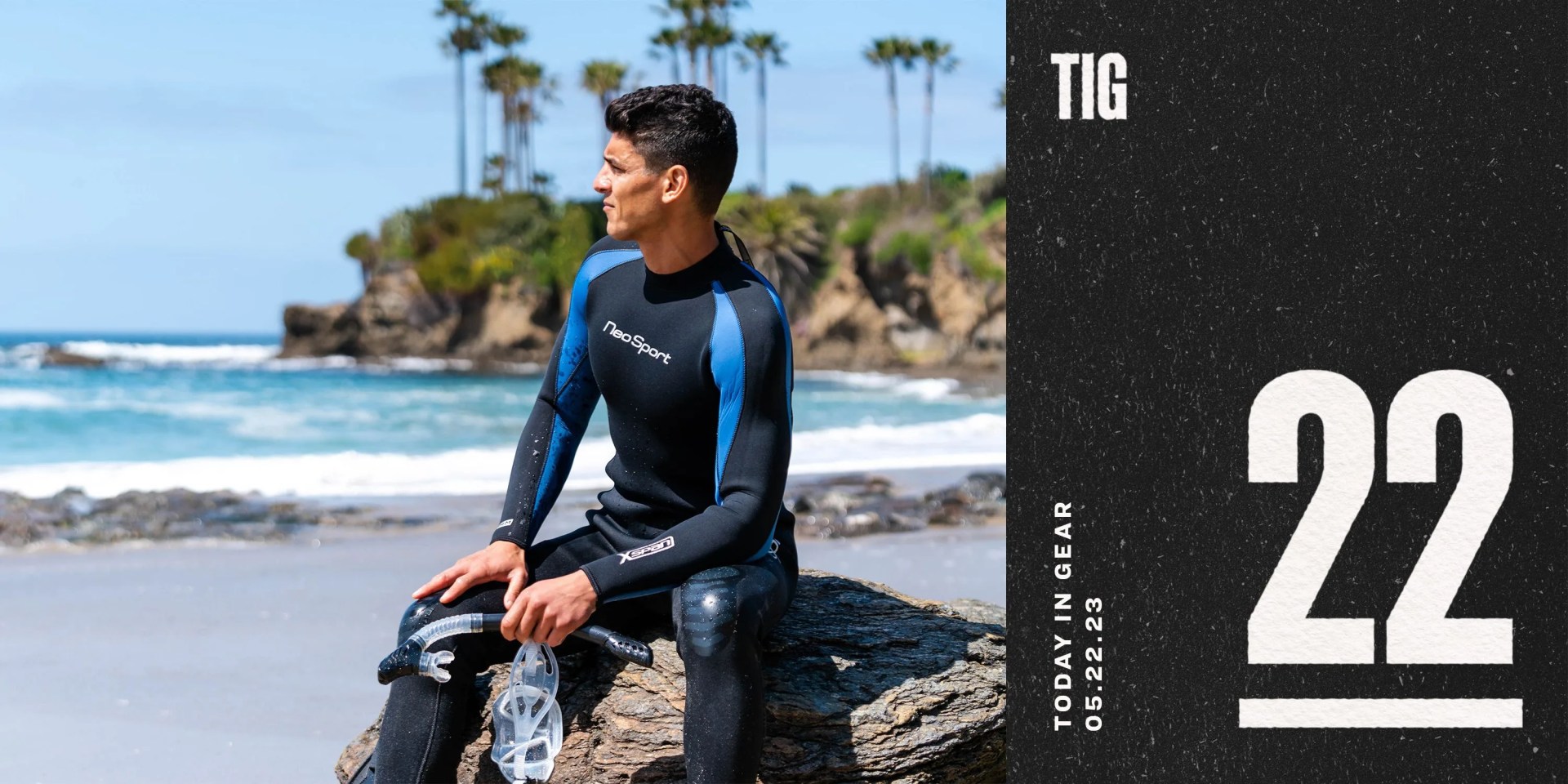 today in gear may 22 2023 man wearing scuba gear sitting on rock by ocean
