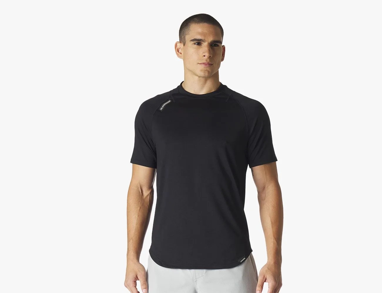 a man wearing a workout tshirt