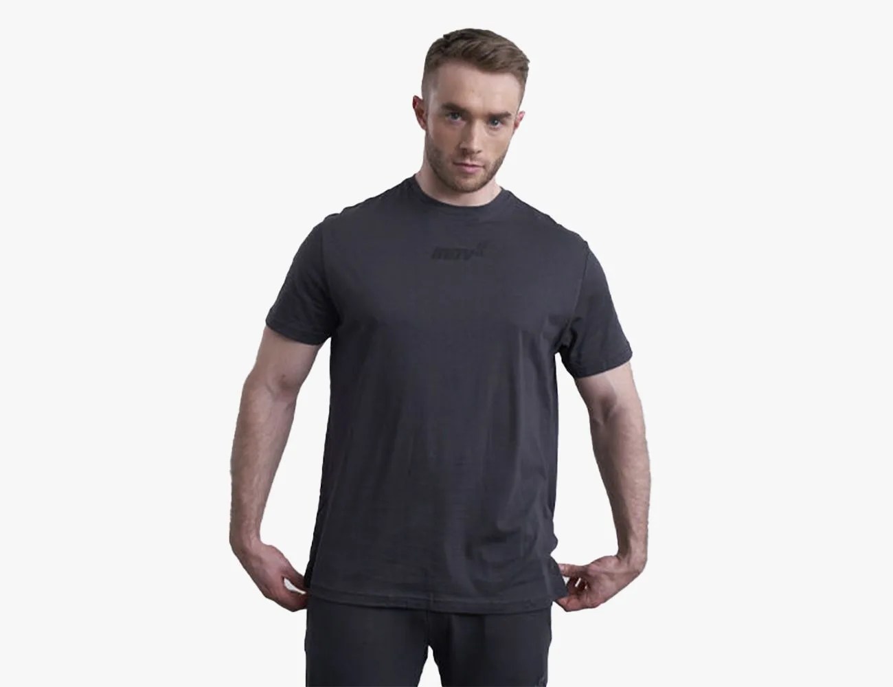 a man wearing a workout tshirt