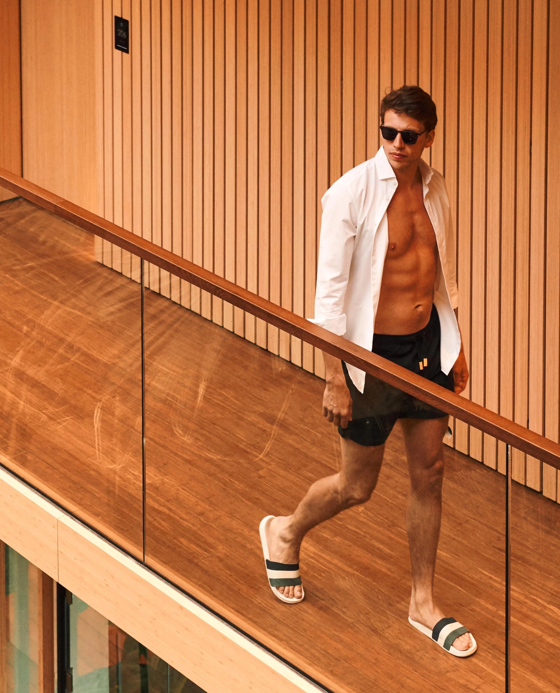 man walking wearing rake shorts