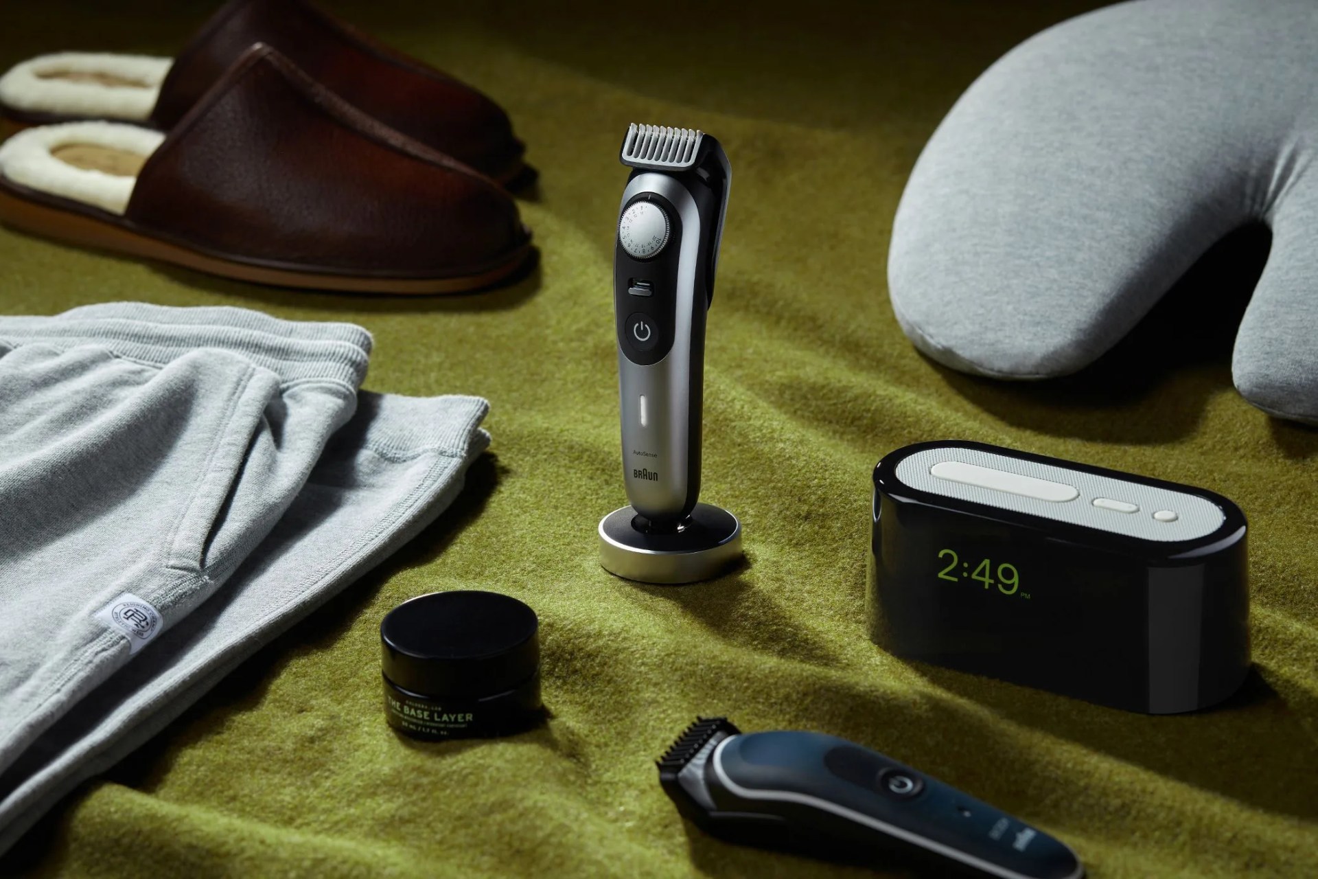 braun razors, neck pillow, slippers, sweats, body lotion, and clock