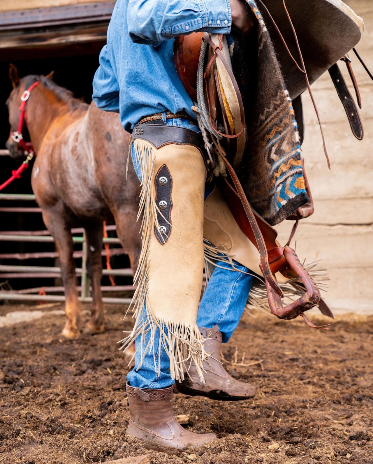 man wearing huckberry x crocs classic western boot