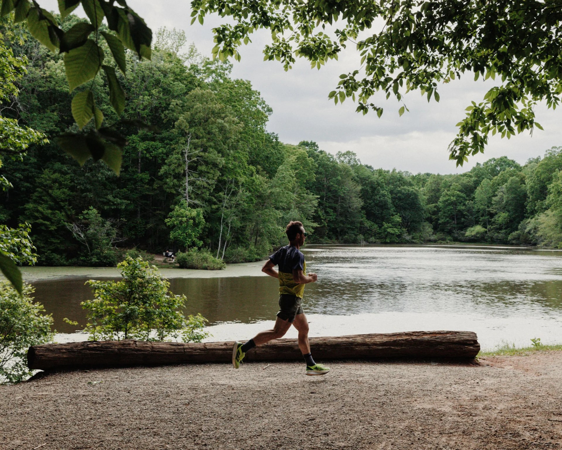 man running by river