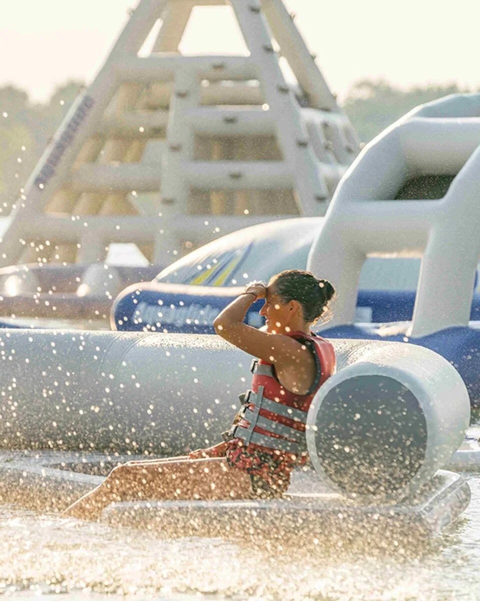 woman lounging on aquaglide c lounge